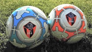 Diamond Soccer coaches with the customized balls.